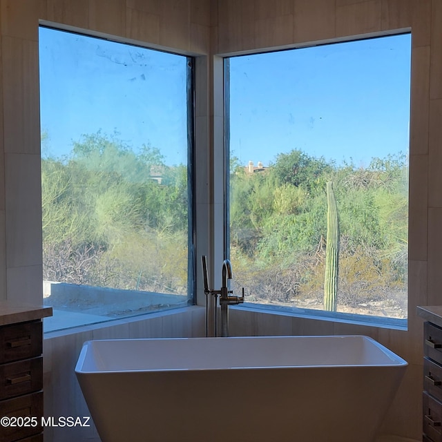 14295 N Silent Sky Pl, Marana, AZ 85658 - bathroom view of a soaking tub and vanity