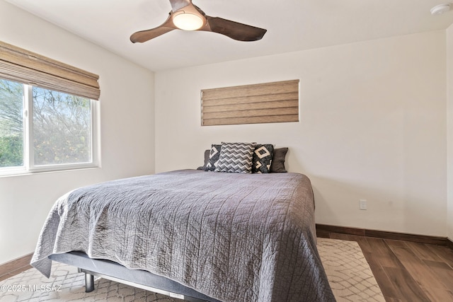 2302 N Norton Ave, Tucson, AZ 85719 - bedroom with baseboards, ceiling fan, and wood finished floors
