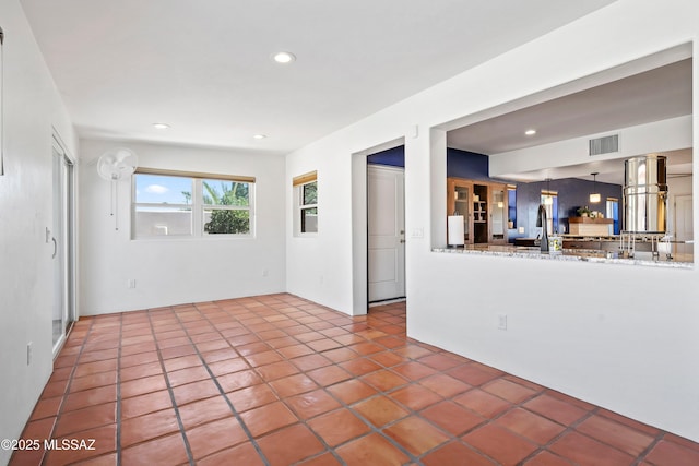 2302 N Norton Ave, Tucson, AZ 85719 - unfurnished living room featuring recessed lighting