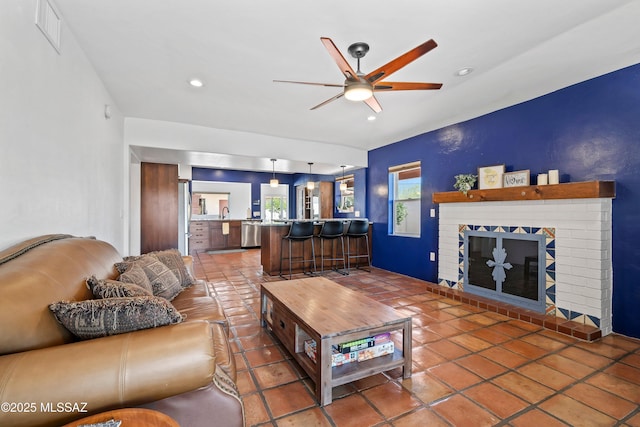 2302 N Norton Ave, Tucson, AZ 85719 - living area featuring a ceiling fan, recessed lighting, and a fireplace