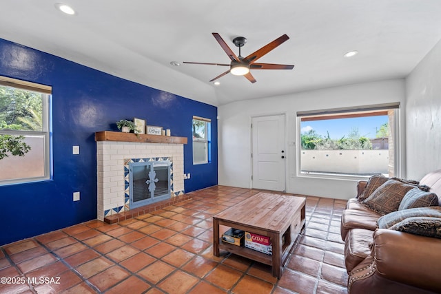 2302 N Norton Ave, Tucson, AZ 85719 - living room with healthy amount of natural light, a ceiling fan, recessed lighting, and a fireplace