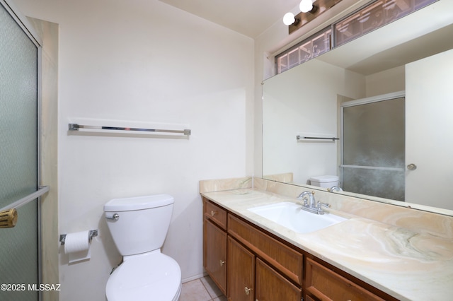 201 N Cloverland Ave, Tucson, AZ 85711 - bathroom with toilet, vanity, a shower with door, and tile patterned floors
