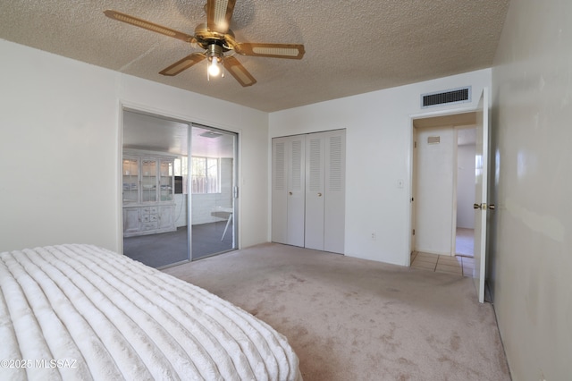 201 N Cloverland Ave, Tucson, AZ 85711 - bedroom featuring light carpet, a textured ceiling, and ceiling fan