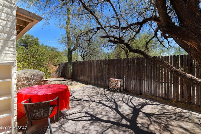 201 N Cloverland Ave, Tucson, AZ 85711 - fenced backyard with a patio area