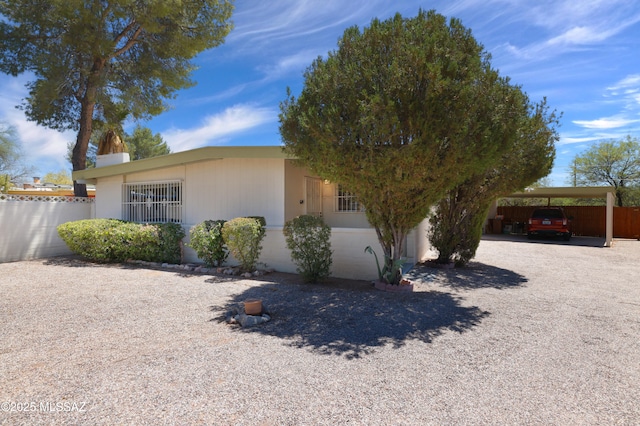 201 N Cloverland Ave, Tucson, AZ 85711 - view of front of home with a carport