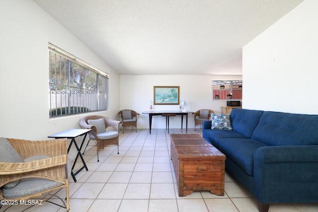 201 N Cloverland Ave, Tucson, AZ 85711 - living room featuring light tile patterned floors and a textured ceiling