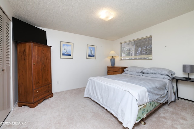 201 N Cloverland Ave, Tucson, AZ 85711 - carpeted bedroom featuring a textured ceiling and a closet