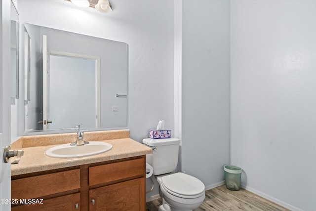139 W Cheevers St, Vail, AZ 85641 - bathroom featuring toilet, vanity, and wood finished floors