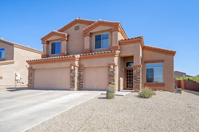 139 W Cheevers St, Vail, AZ 85641 - view of front of property with an attached garage, stucco siding, stone siding, and a tiled roof