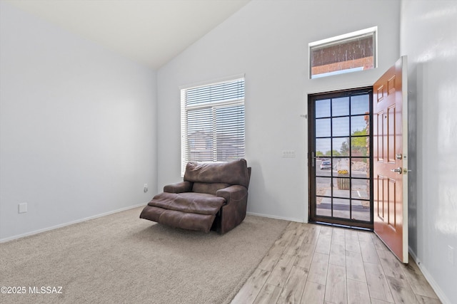 139 W Cheevers St, Vail, AZ 85641 - sitting room featuring plenty of natural light, high vaulted ceiling, light wood-style floors, and baseboards