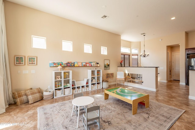 13715 N Tessali Way, Tucson, AZ 85755 - rec room featuring a chandelier, tile patterned flooring, and recessed lighting