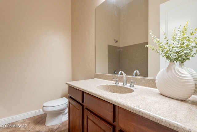 13715 N Tessali Way, Tucson, AZ 85755 - full bath with toilet, vanity, tile patterned floors, a shower, and baseboards
