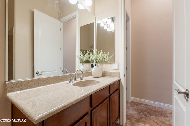 13715 N Tessali Way, Tucson, AZ 85755 - bathroom featuring vanity and baseboards
