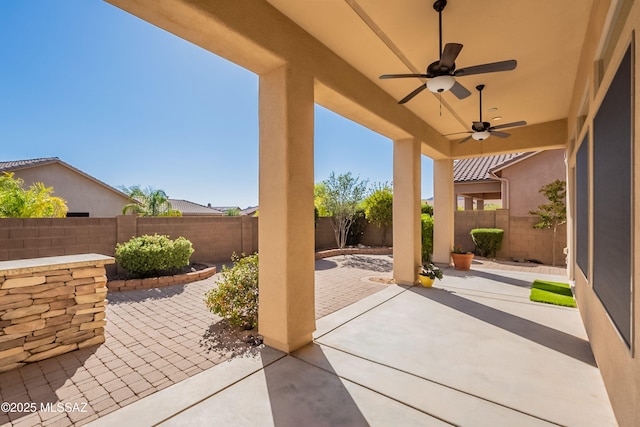 13715 N Tessali Way, Tucson, AZ 85755 - fenced backyard featuring a patio area and ceiling fan