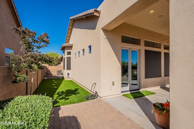 13715 N Tessali Way, Tucson, AZ 85755 - entrance to property featuring stucco siding, a patio area, and a tile roof