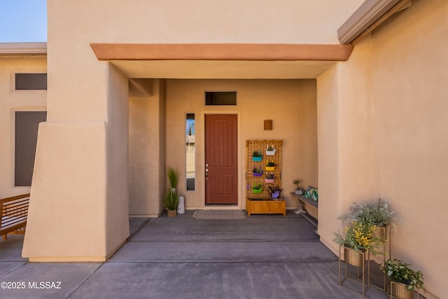 13715 N Tessali Way, Tucson, AZ 85755 - doorway to property featuring stucco siding