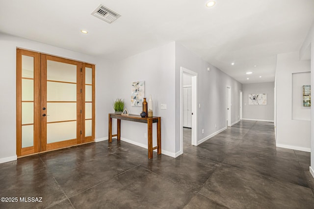9840 N Desert Sky Rd, Tucson, AZ 85737 - entryway featuring concrete flooring, french doors, baseboards, and recessed lighting