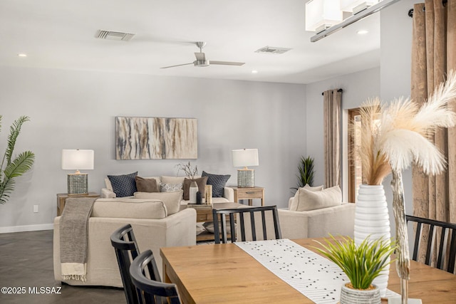 9840 N Desert Sky Rd, Tucson, AZ 85737 - living room with a ceiling fan, baseboards, recessed lighting, and finished concrete floors