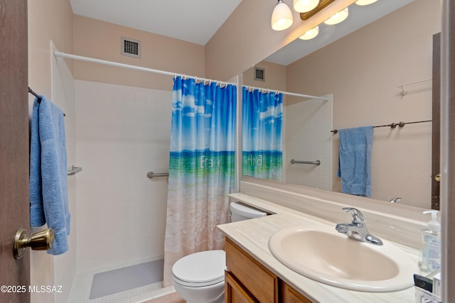2819 W Jennie Ln, Tucson, AZ 85713 - bathroom featuring toilet, a tile shower, and vanity