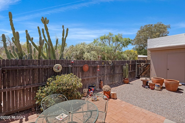 2819 W Jennie Ln, Tucson, AZ 85713 - view of patio with outdoor dining space and a fenced backyard