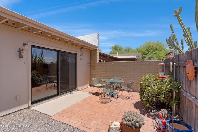 2819 W Jennie Ln, Tucson, AZ 85713 - view of patio with outdoor dining space and a fenced backyard