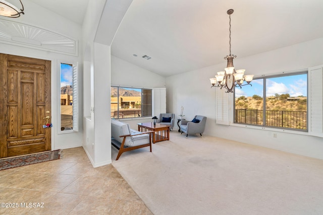 1048 E Rodda River Pl, Tucson, AZ 85718 - carpeted foyer with a chandelier, vaulted ceiling, healthy amount of natural light, and tile patterned floors