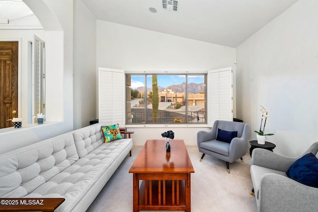 1048 E Rodda River Pl, Tucson, AZ 85718 - carpeted living area featuring arched walkways and high vaulted ceiling