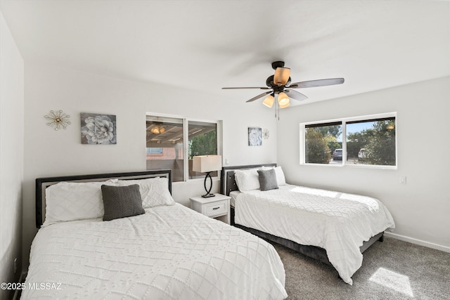 5247 E 6th St, Tucson, AZ 85711 - bedroom with baseboards, a ceiling fan, and carpet flooring