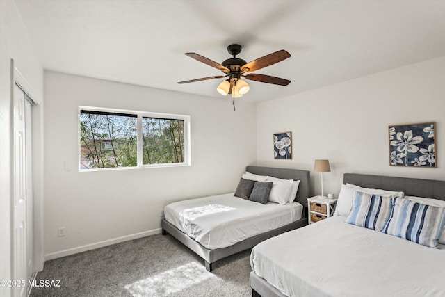 5247 E 6th St, Tucson, AZ 85711 - bedroom with baseboards, carpet, and a ceiling fan