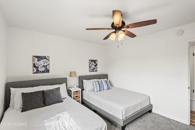 5247 E 6th St, Tucson, AZ 85711 - bedroom with baseboards and a ceiling fan