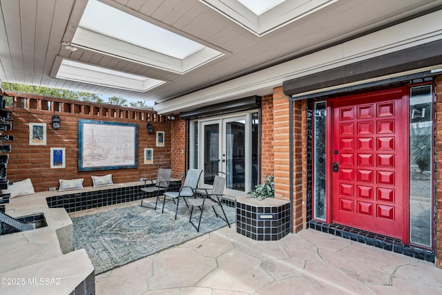 5247 E 6th St, Tucson, AZ 85711 - property entrance featuring french doors and a patio