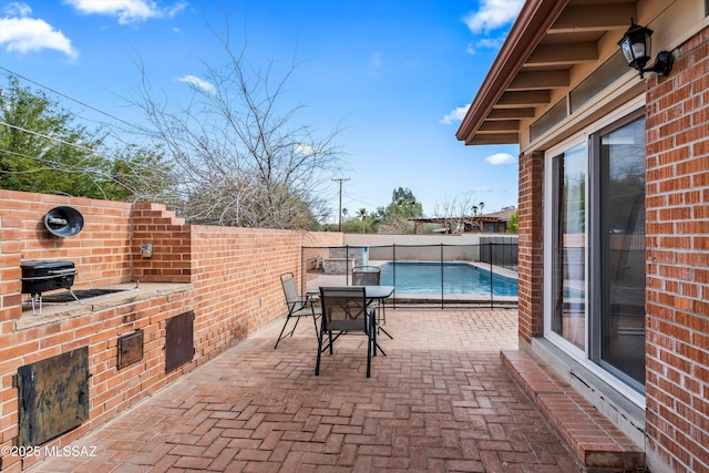 5247 E 6th St, Tucson, AZ 85711 - fenced backyard with a patio and outdoor dining space