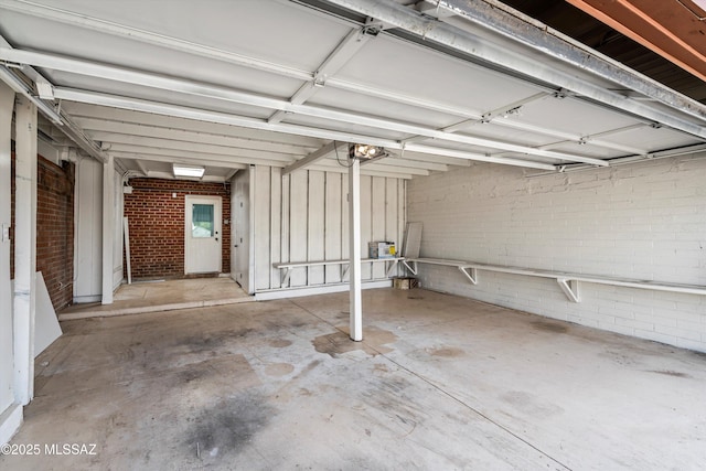 5247 E 6th St, Tucson, AZ 85711 - garage featuring a garage door opener