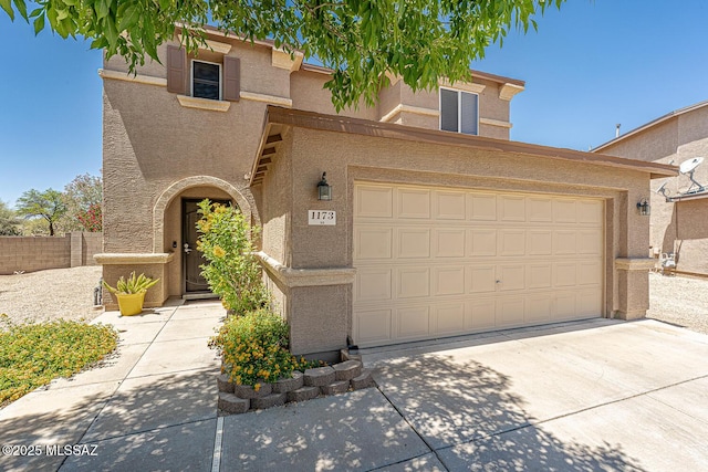 1173 W Calle Vista De Suenos, Sahuarita, AZ 85629 - view of front of house featuring stucco siding, driveway, and a garage