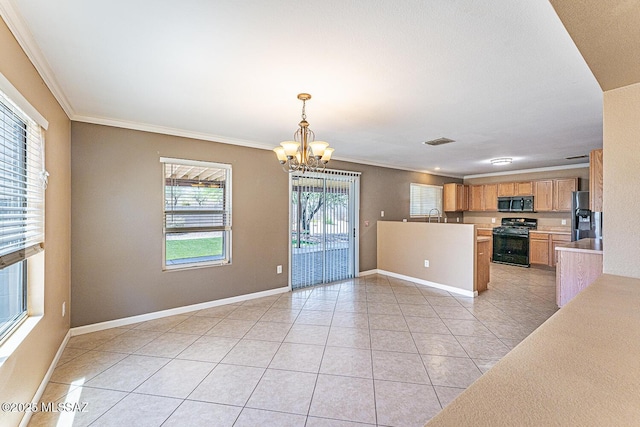 1173 W Calle Vista De Suenos, Sahuarita, AZ 85629 - kitchen featuring appliances with stainless steel finishes, a chandelier, light countertops, light tile patterned floors, and open floor plan