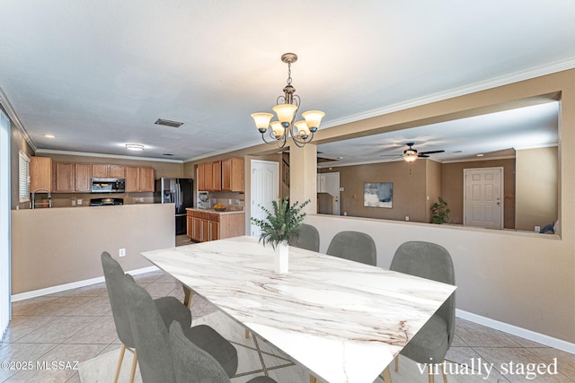 1173 W Calle Vista De Suenos, Sahuarita, AZ 85629 - dining area featuring a chandelier, light tile patterned floors, baseboards, ornamental molding, and ceiling fan