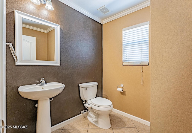 1173 W Calle Vista De Suenos, Sahuarita, AZ 85629 - bathroom with toilet, tile patterned floors, ornamental molding, and baseboards