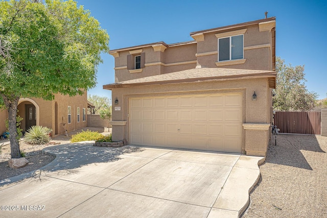 1173 W Calle Vista De Suenos, Sahuarita, AZ 85629 - view of front of home with stucco siding, driveway, and a garage