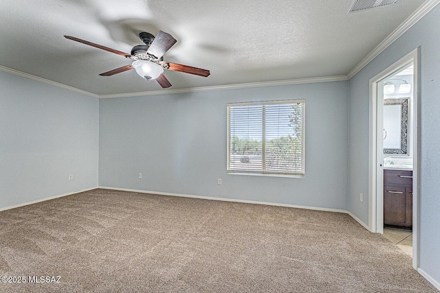 1173 W Calle Vista De Suenos, Sahuarita, AZ 85629 - empty room featuring light colored carpet, a ceiling fan, crown molding, baseboards, and a textured ceiling