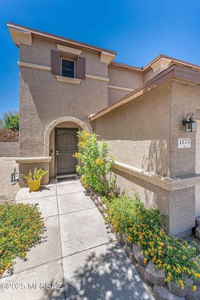 1173 W Calle Vista De Suenos, Sahuarita, AZ 85629 - view of exterior entry with stucco siding