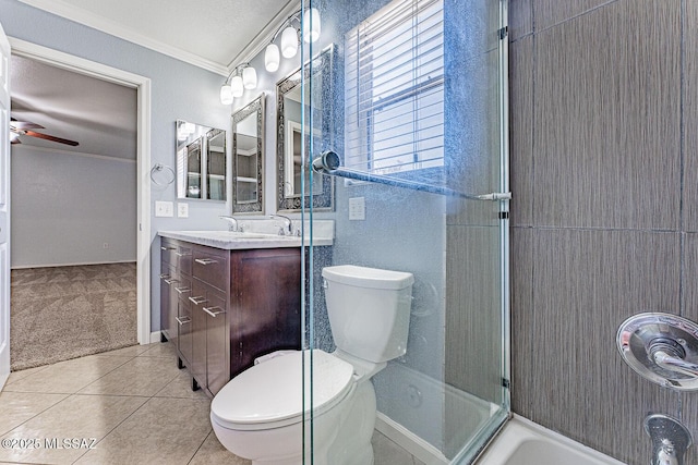 1173 W Calle Vista De Suenos, Sahuarita, AZ 85629 - bathroom featuring toilet, ornamental molding, vanity, ceiling fan, and tile patterned floors