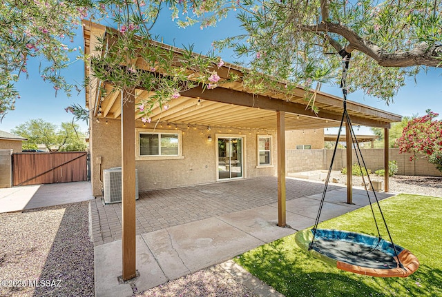 1173 W Calle Vista De Suenos, Sahuarita, AZ 85629 - view of patio / terrace featuring central AC unit and a gate
