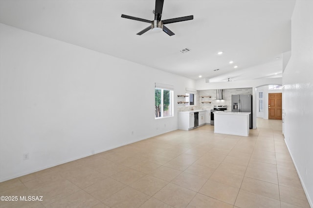 12122 N Sterling Ave, Oro Valley, AZ 85755 - unfurnished living room with a ceiling fan, recessed lighting, light tile patterned flooring, a sink, and baseboards