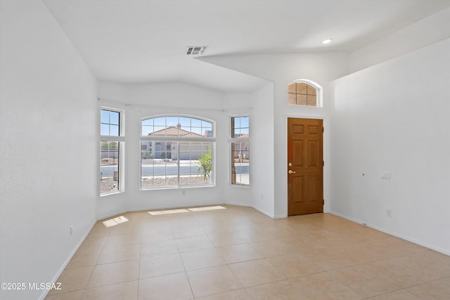 12122 N Sterling Ave, Oro Valley, AZ 85755 - foyer entrance with vaulted ceiling, light tile patterned floors, and baseboards