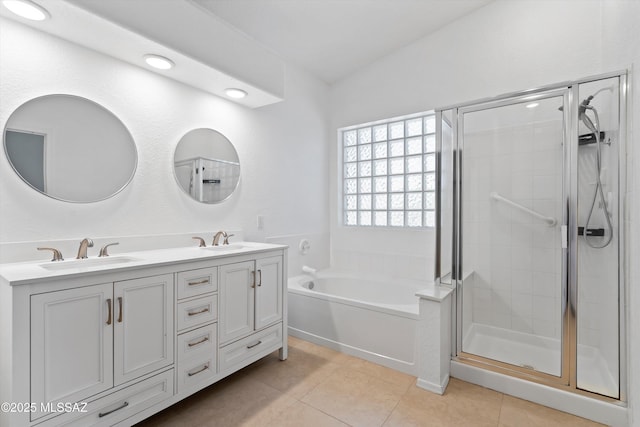 12122 N Sterling Ave, Oro Valley, AZ 85755 - full bathroom with a garden tub, double vanity, a stall shower, and tile patterned floors
