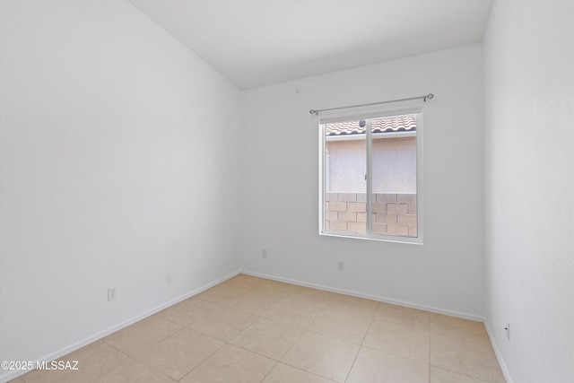 12122 N Sterling Ave, Oro Valley, AZ 85755 - unfurnished room with baseboards and light tile patterned flooring