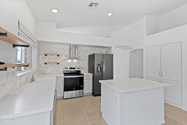 12122 N Sterling Ave, Oro Valley, AZ 85755 - kitchen featuring stainless steel appliances, a sink, wall chimney range hood, tasteful backsplash, and light tile patterned floors