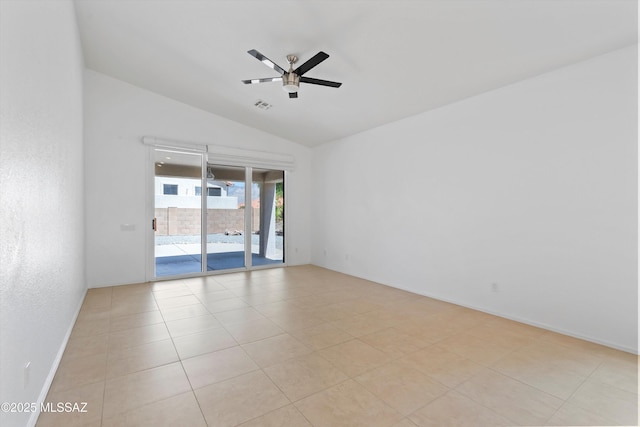 12122 N Sterling Ave, Oro Valley, AZ 85755 - empty room with a ceiling fan, lofted ceiling, light tile patterned flooring, and baseboards