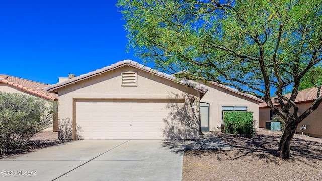 2943 N Gold Creek Pl, Tucson, AZ 85745 - ranch-style house with a garage, stucco siding, driveway, cooling unit, and a tiled roof