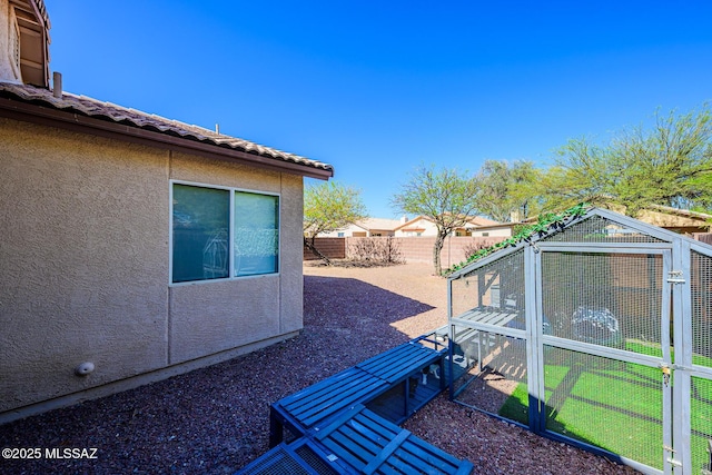 2943 N Gold Creek Pl, Tucson, AZ 85745 - fenced backyard featuring exterior structure and an outbuilding